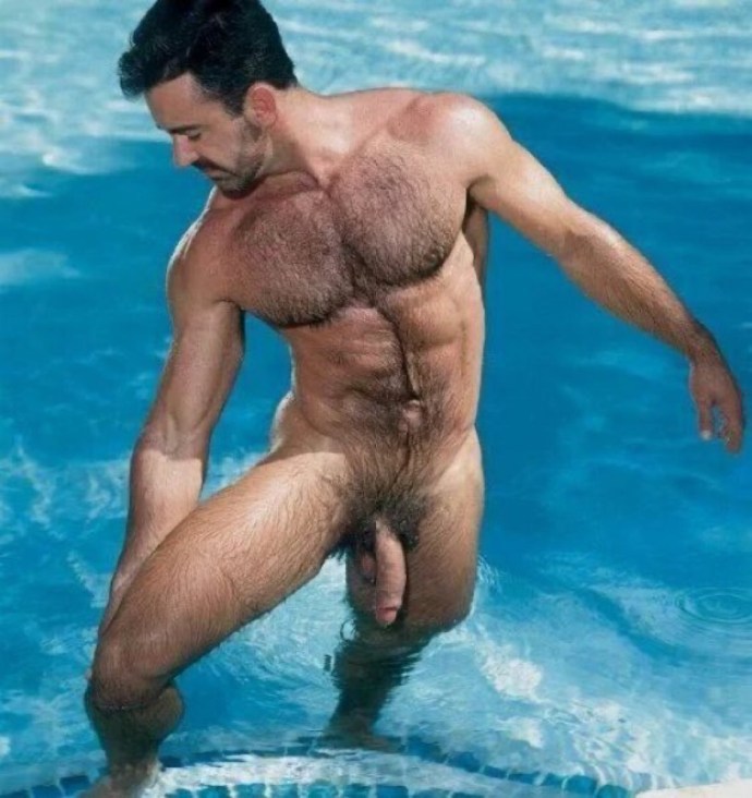 Naked hairy men on the beach