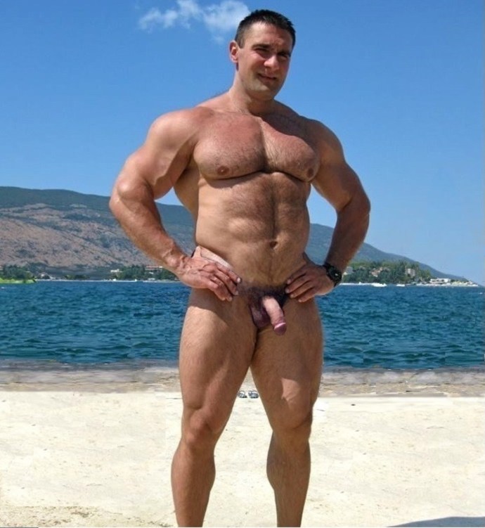 Naked pumped up guys on the beach