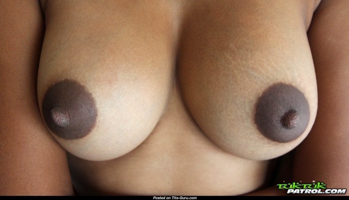 Breasts with brown nipples