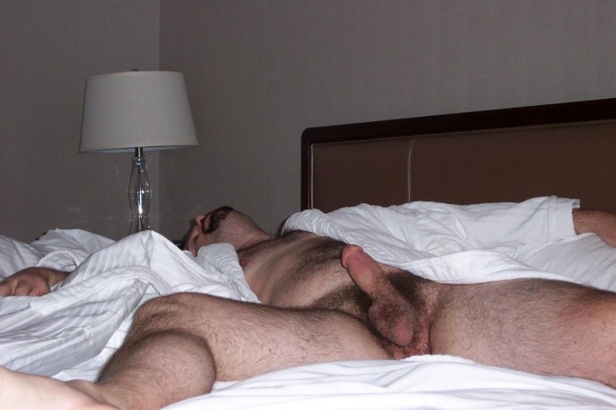 Men's buttocks on the bed