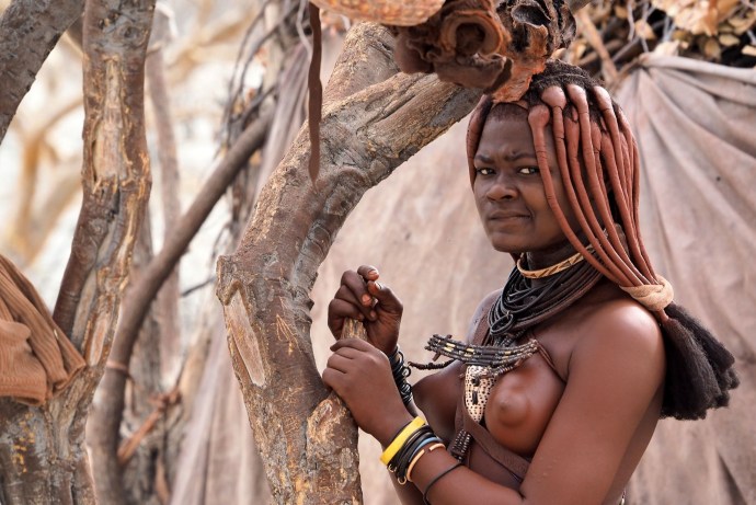 Sitting girls from African tribes