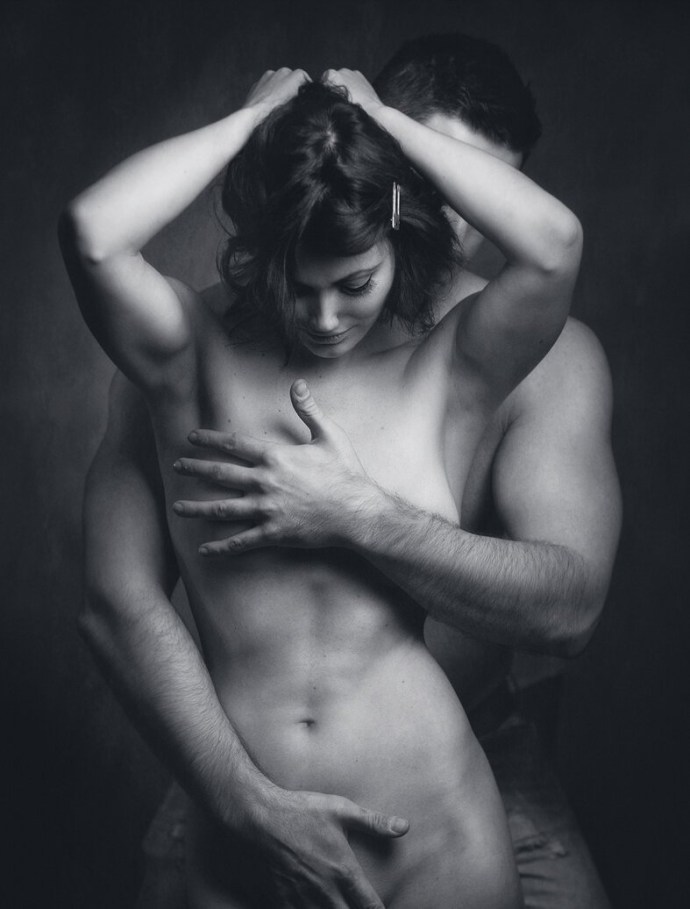The girl undresses in front of the guy