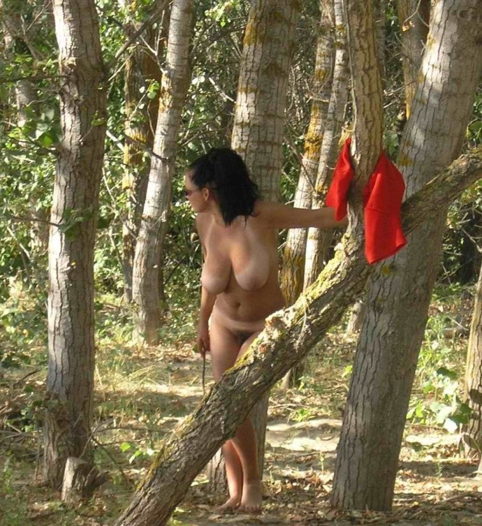 Naked adult women in the forest