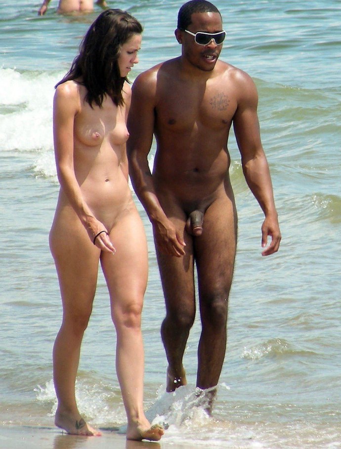 Wife with a black man on the beach private