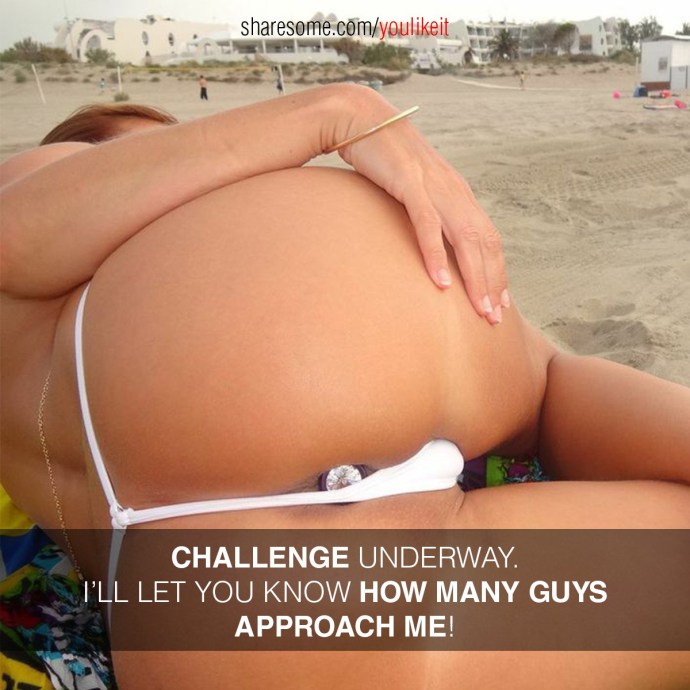 Naked women in thongs on the beach