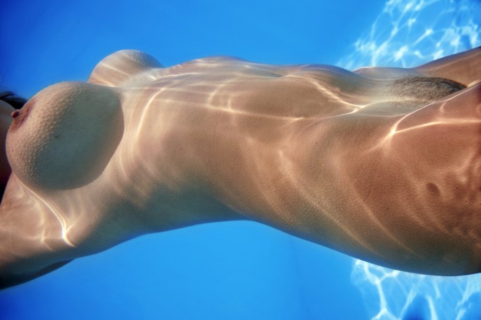 Naked beauties underwater