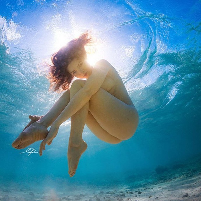 Naked girls in water