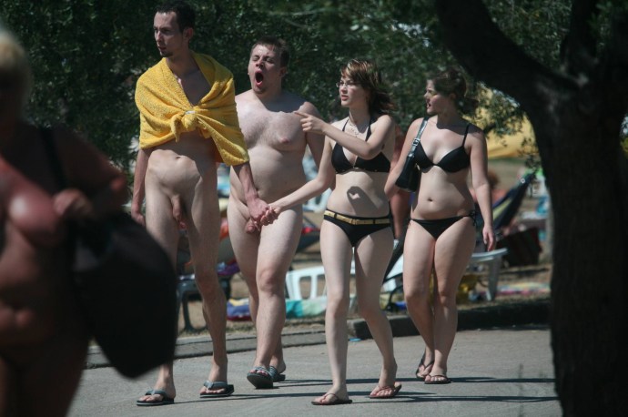 Naked guy on a public beach