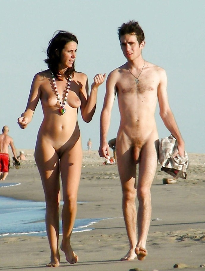 Naked men and women on the beach