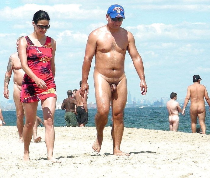 Naked men on a textile beach