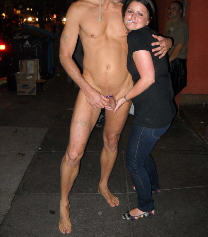 Naked women among dressed men