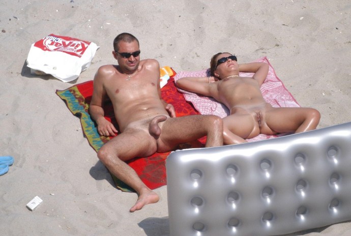Girl with a huge member on the beach