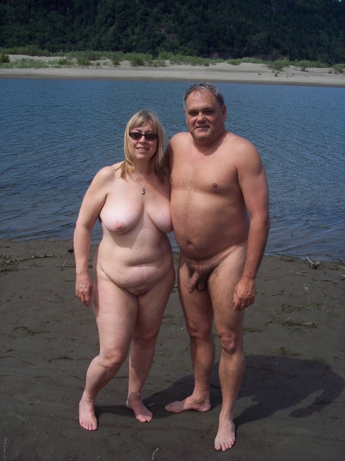 Family couples on a nudic beach