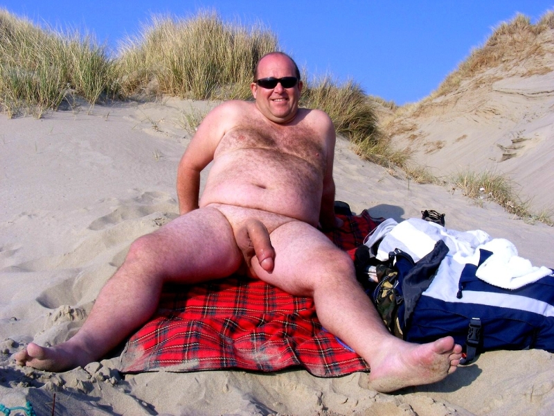 Naked fat men on the beach