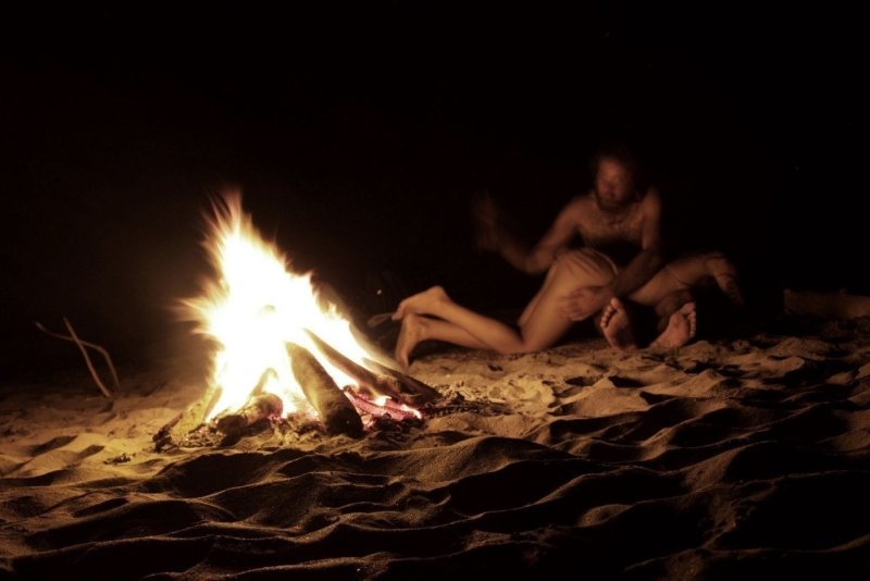 Naked wives near the fire