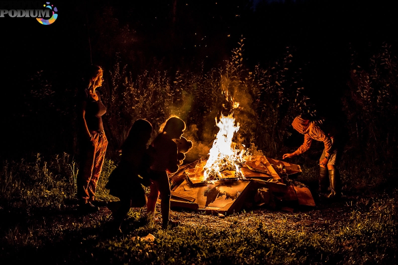Naked girls by the fire
