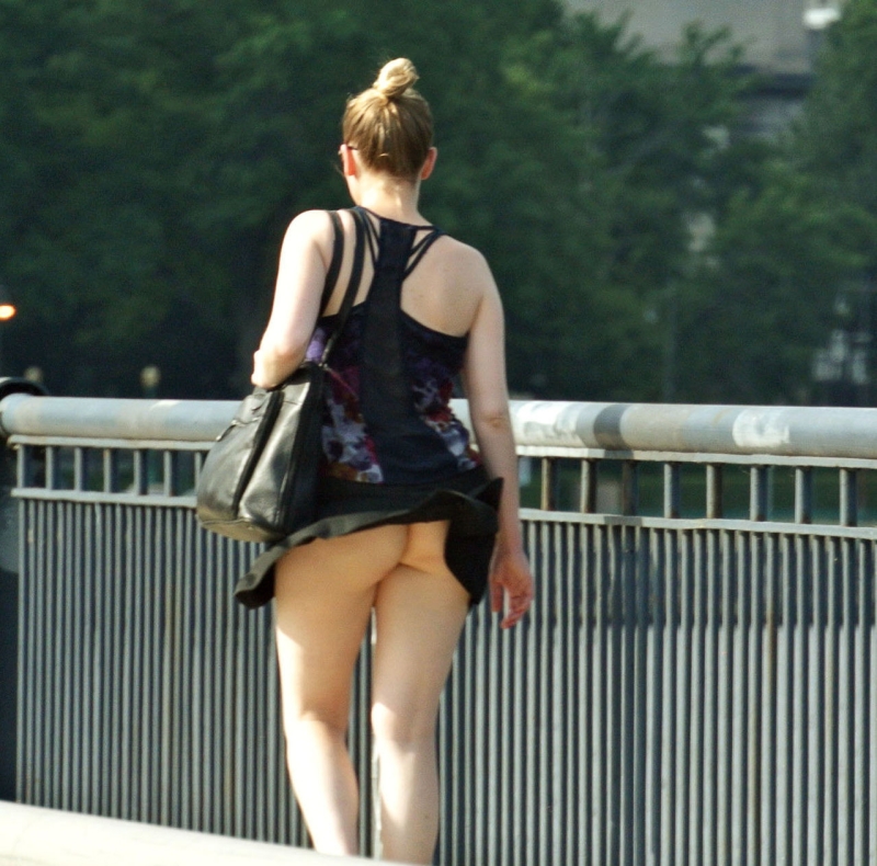 The wind lifted a skirt without panties