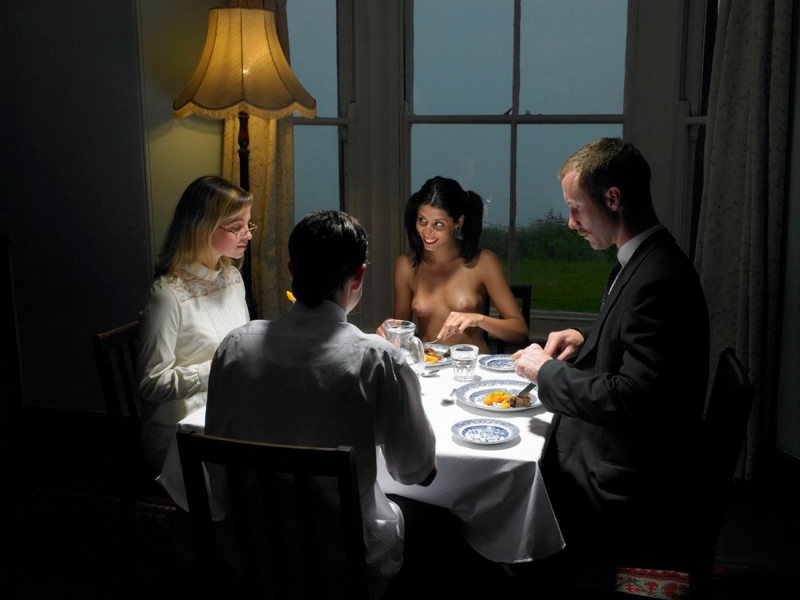 Naked company at the table